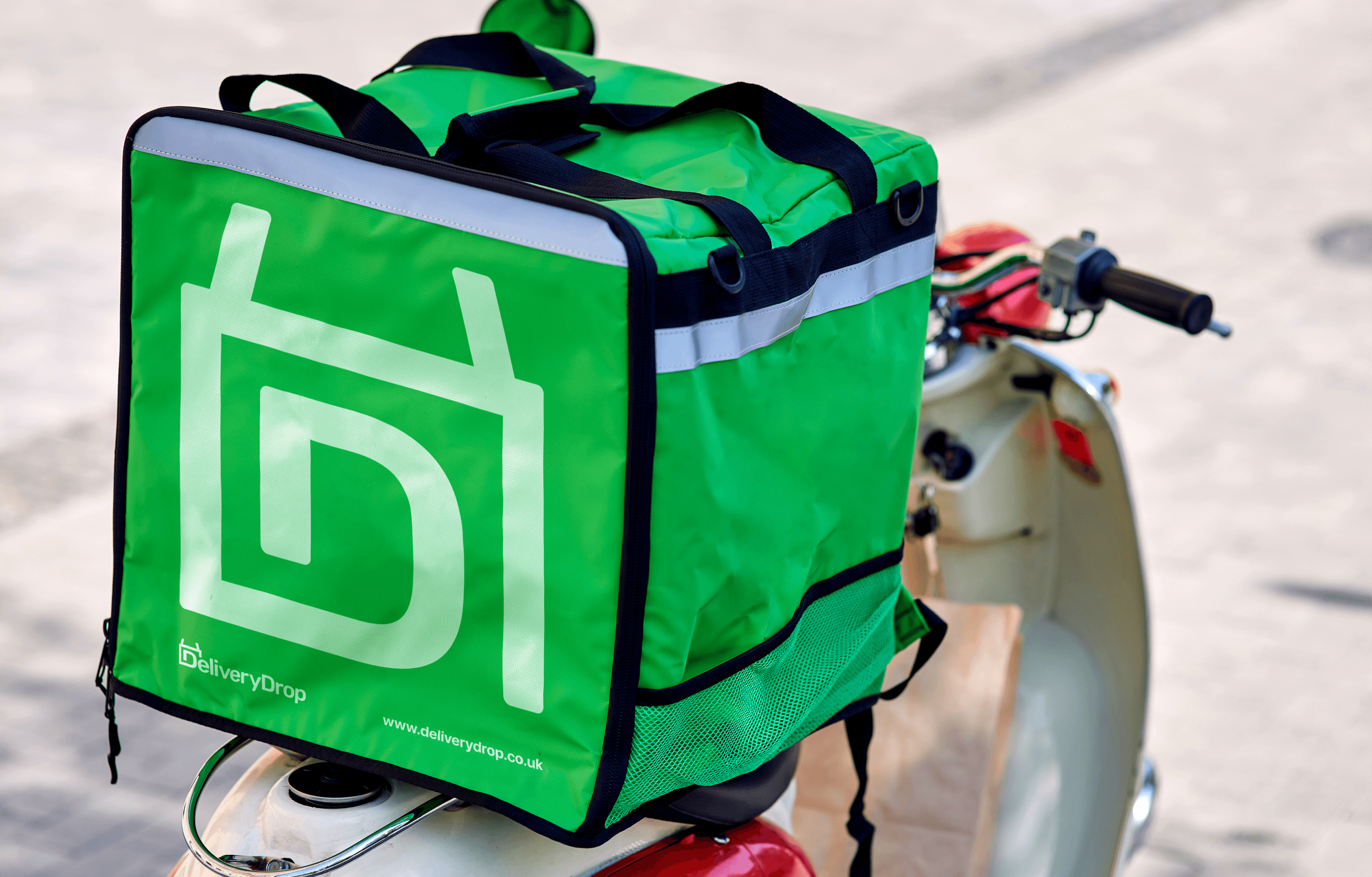 Delivery Drop branded green delivery bag