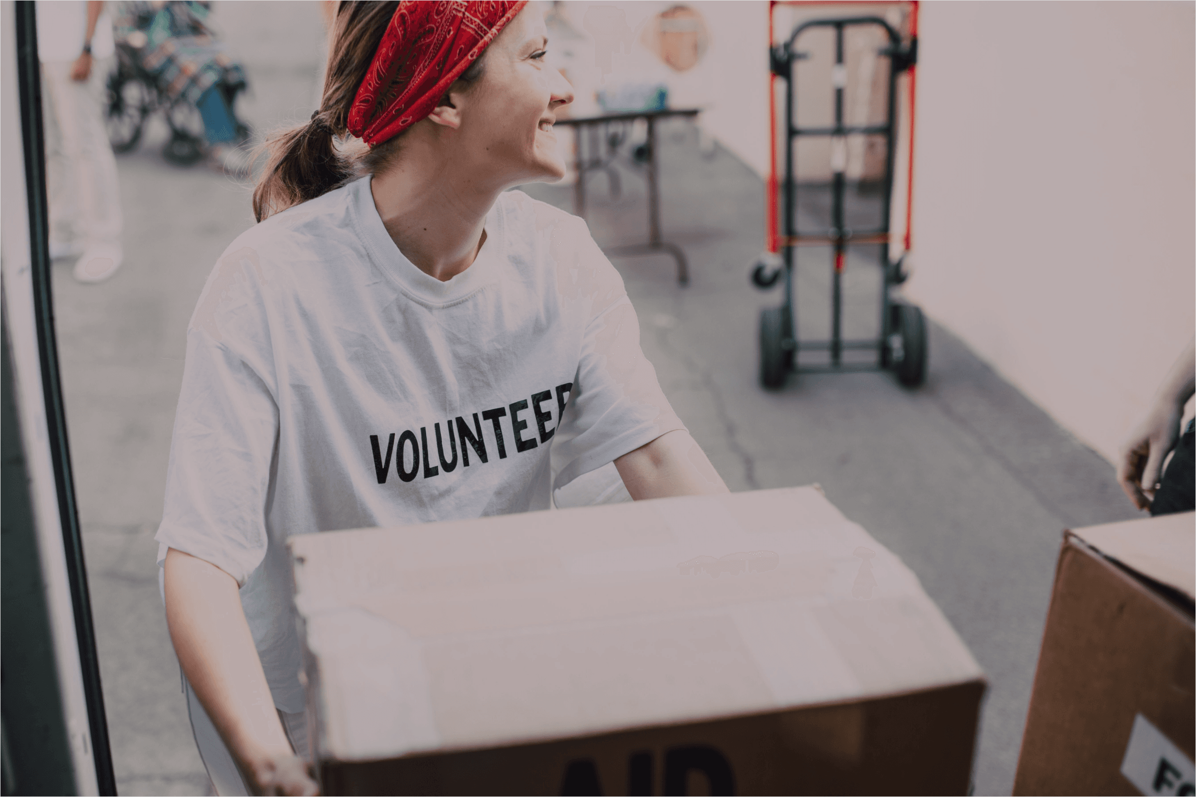Mums United volunteer packing boxes for community support