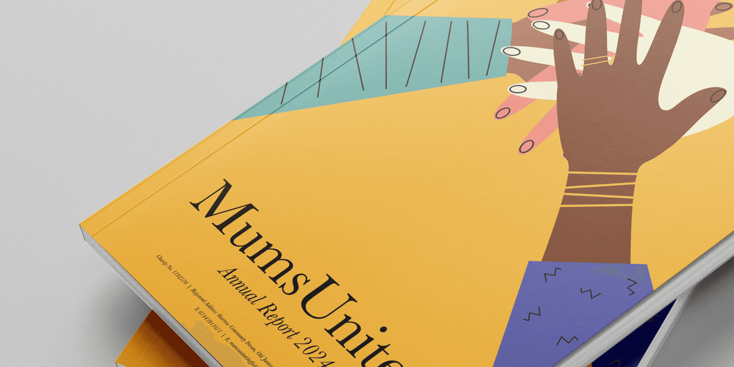 Close-up of an EALA editorial brochure cover with geometric colour blocks